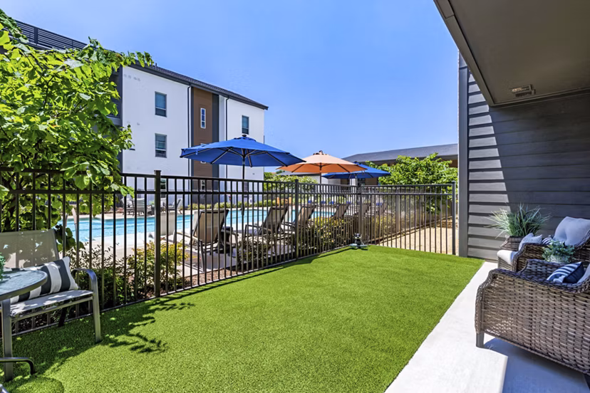 Inviting resident patio with comfortable seating at Album Benbrook Apartments, perfect for outdoor relaxation and social gatherings