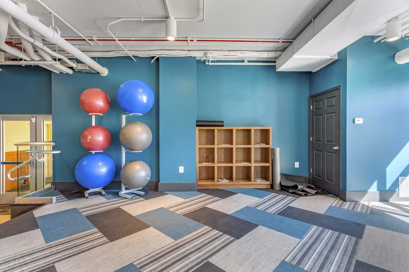 State-of-the-art fitness center with modern equipment at Potomac Towers Apartments