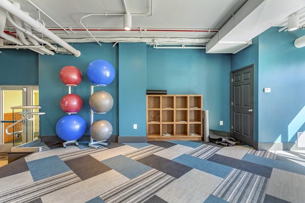 State-of-the-art fitness center with modern equipment at Potomac Towers Apartments