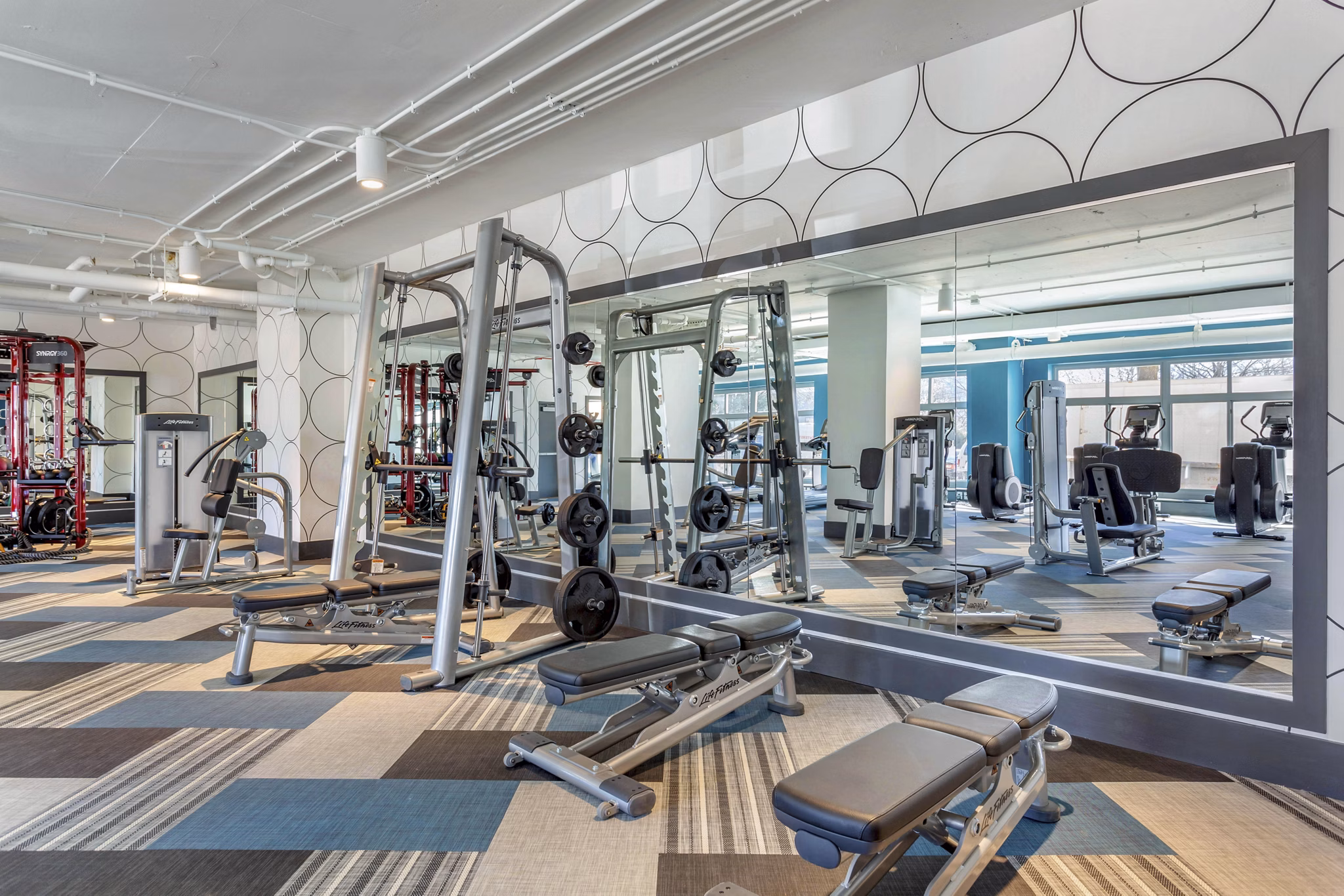 State-of-the-art fitness center featuring modern equipment at Potomac Towers Apartments for active lifestyle residents