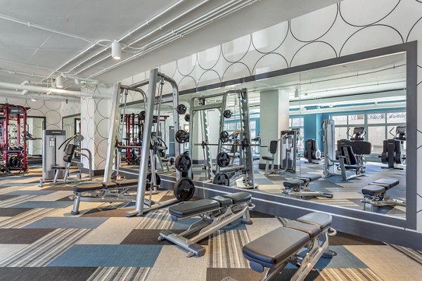 State-of-the-art fitness center featuring modern equipment at Potomac Towers Apartments for active lifestyle residents