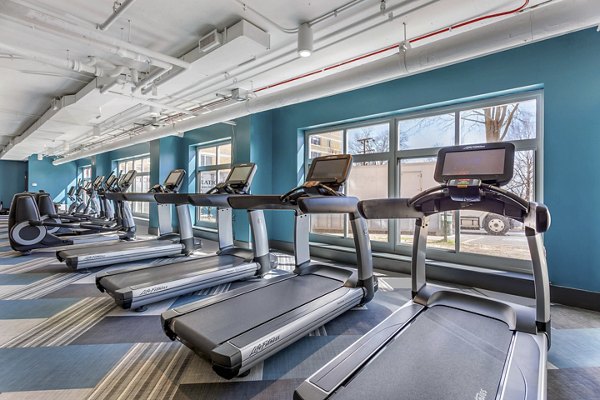 Fitness center with modern equipment at Potomac Towers Apartments