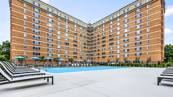 Rooftop pool with panoramic city views at Potomac Towers Apartments