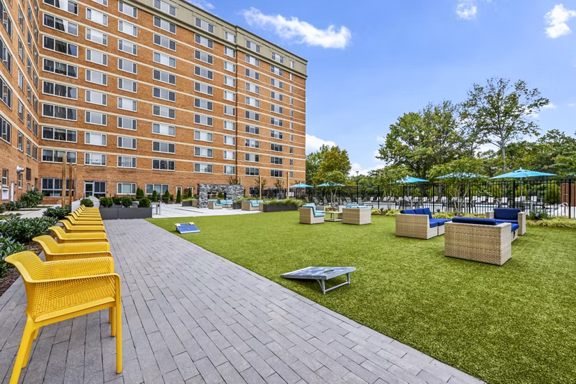 Cozy recreational area with modern furnishings at Potomac Towers Apartments, perfect for relaxation and social gatherings