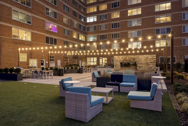 Spacious patio balcony with scenic views at Potomac Towers Apartments, perfect for outdoor relaxation in a luxury setting