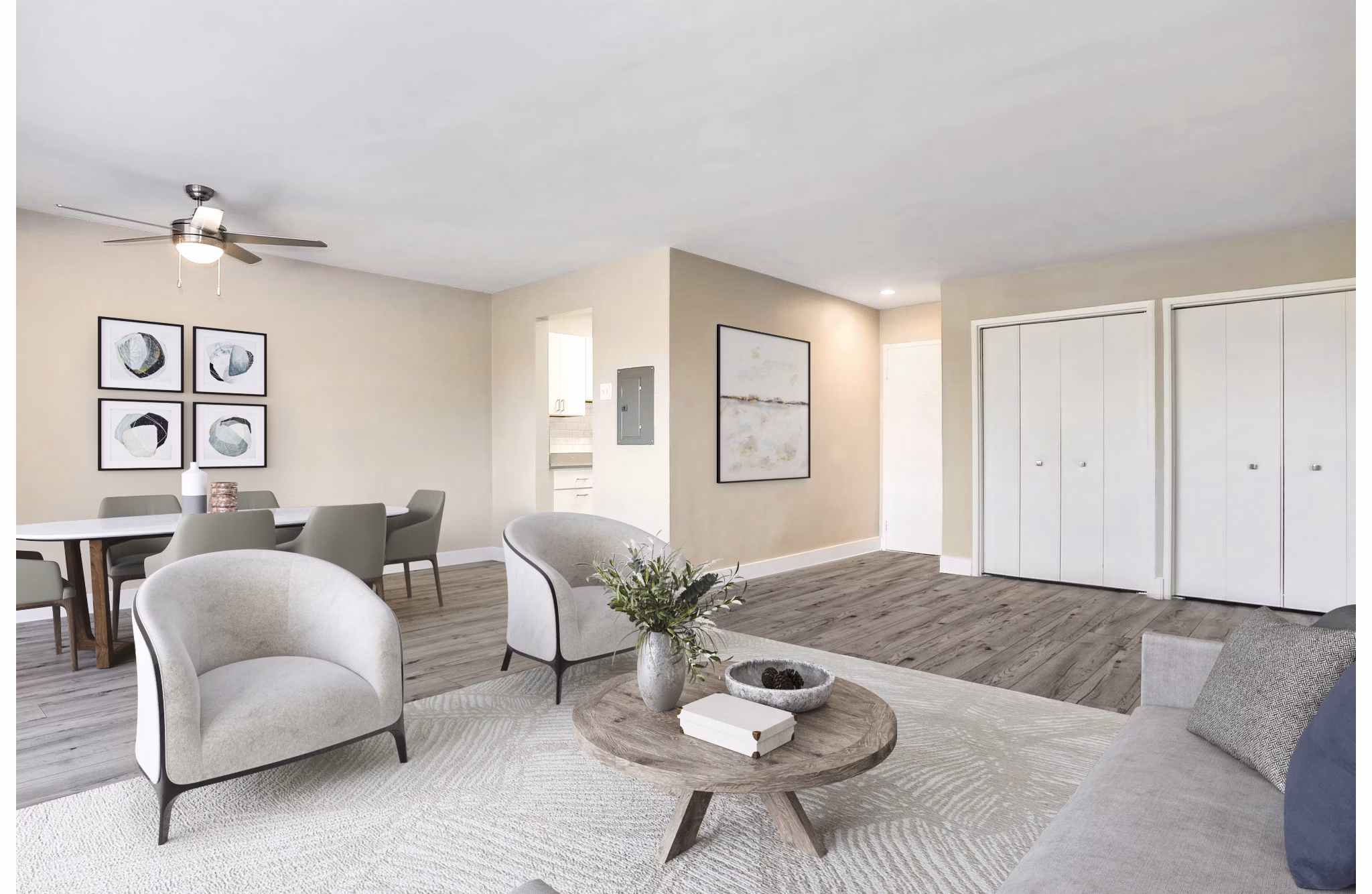 Cozy living room with contemporary decor at Shawnee Apartments, featuring plush seating and natural lighting for a welcoming atmosphere