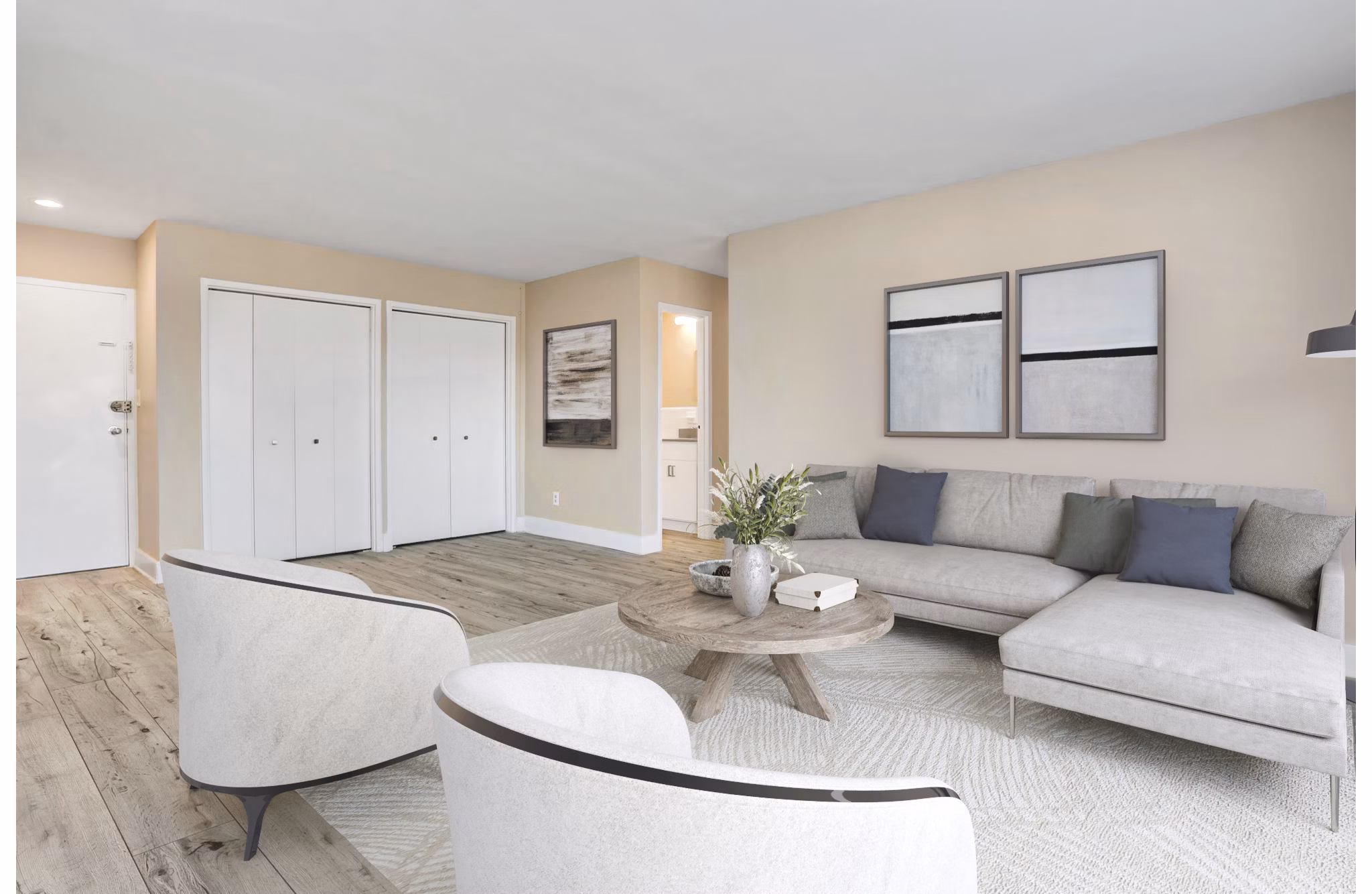 Spacious living room with modern decor and natural light at Shawnee Apartments