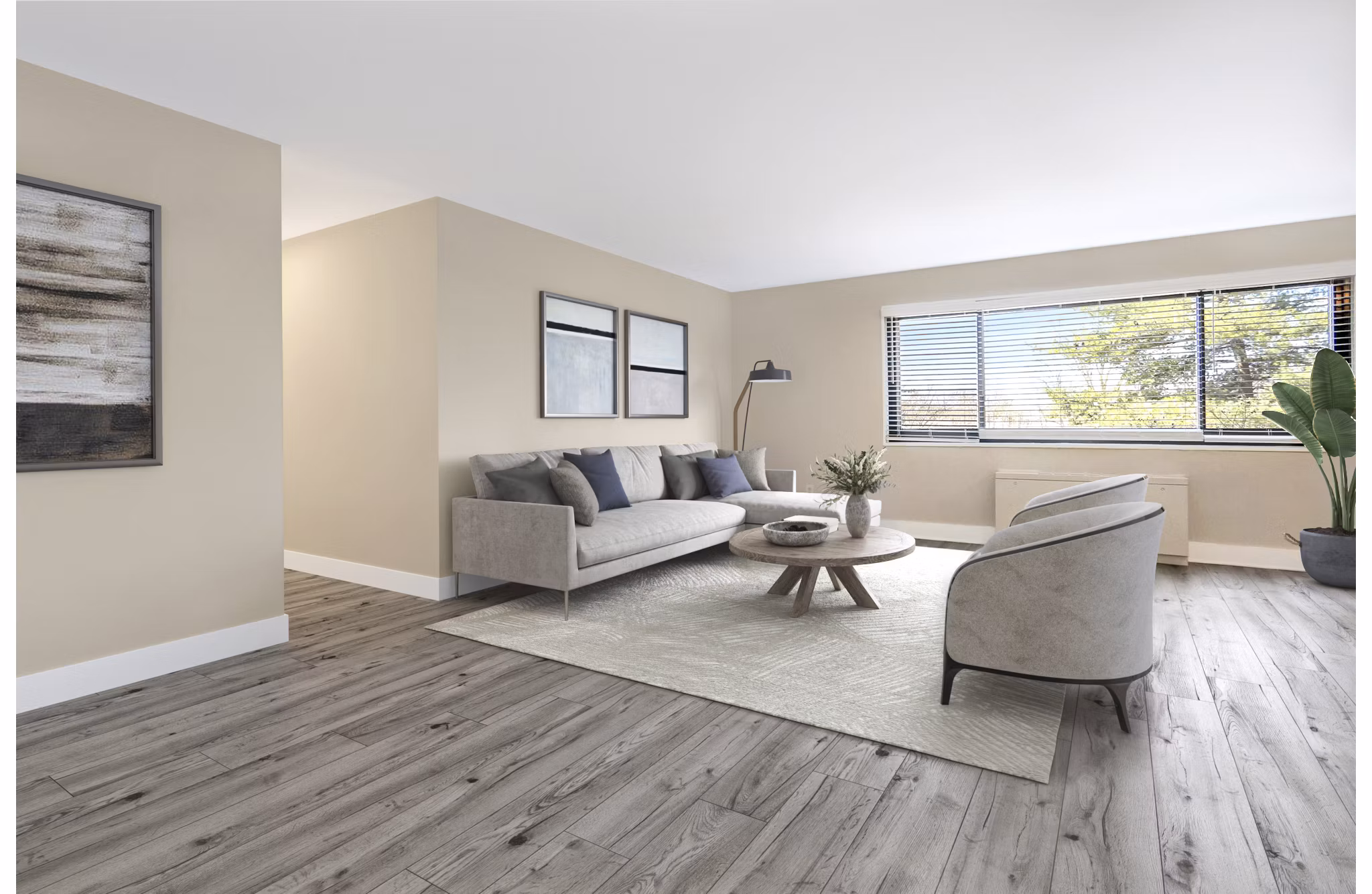 Spacious living room with contemporary decor in Shawnee Apartments, showcasing luxury living at its finest