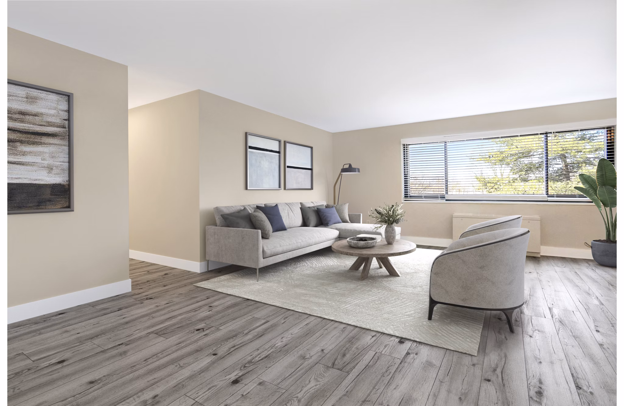 Spacious living room with contemporary decor in Shawnee Apartments, showcasing luxury living at its finest