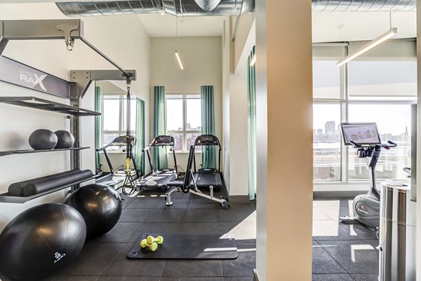 State-of-the-art fitness center featuring modern equipment at Boston East Apartments