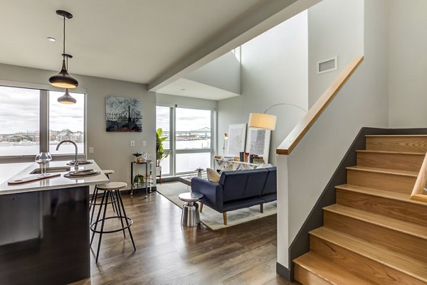 Modern kitchen with stainless steel appliances in Boston East Apartments