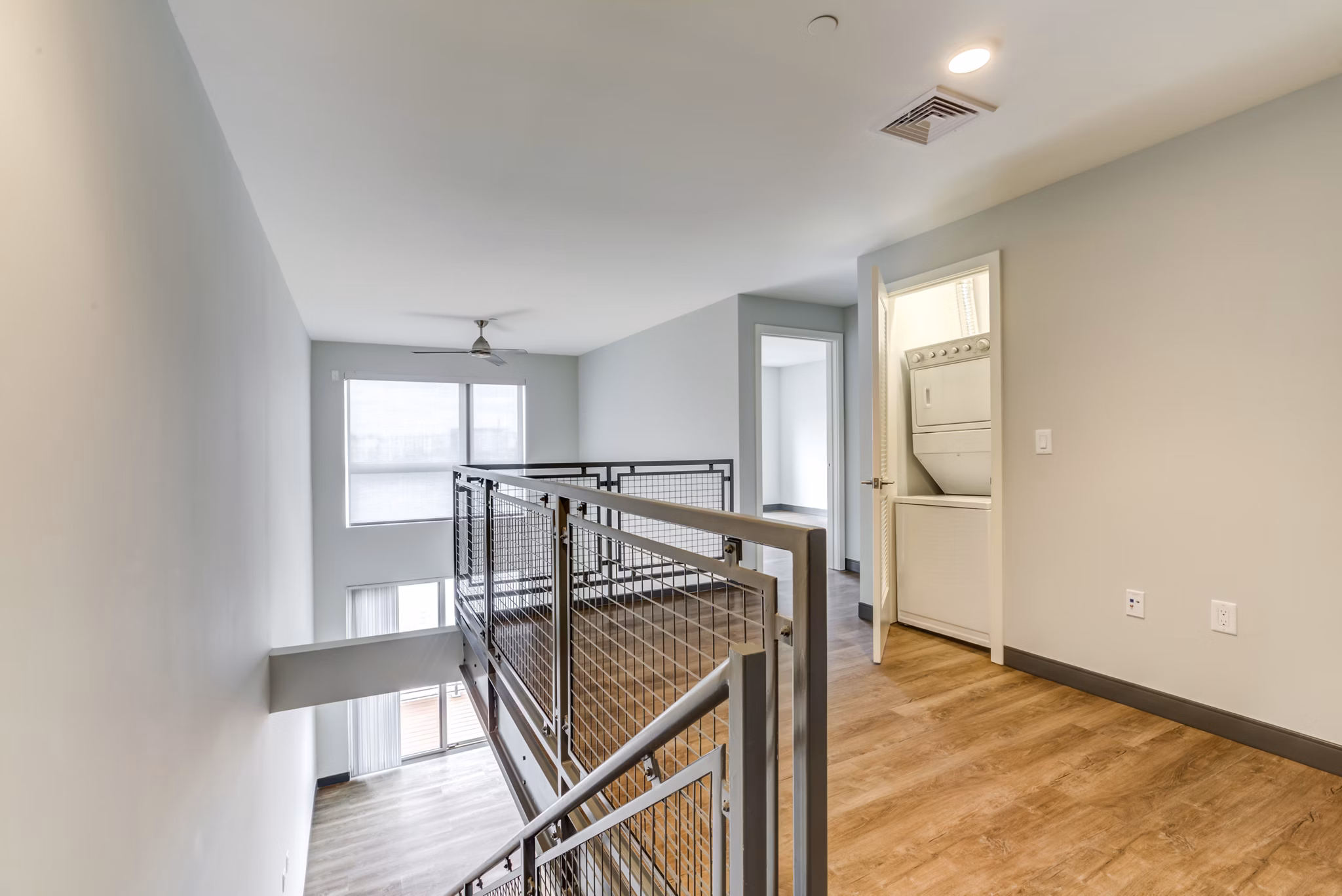 Modern kitchen with stainless steel appliances in Boston East Apartments