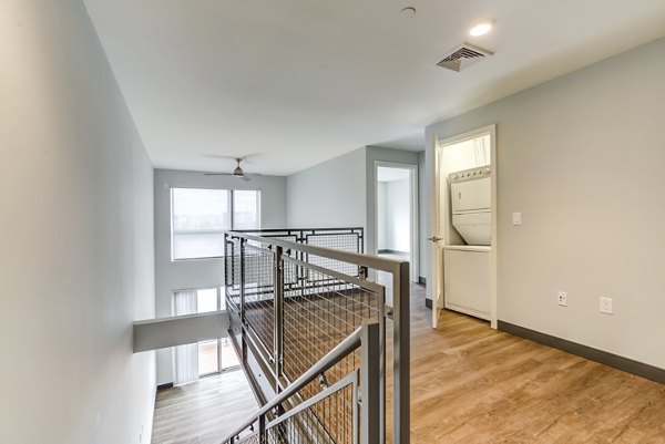 Modern kitchen with stainless steel appliances in Boston East Apartments