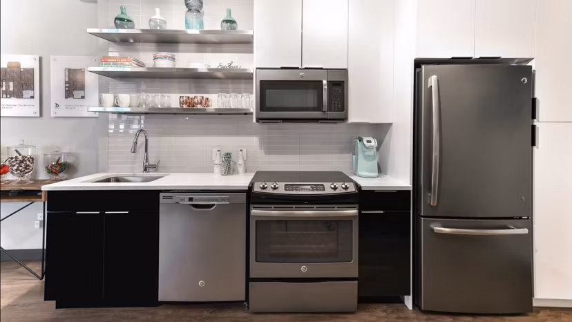 Modern kitchen with stainless steel appliances at Boston East Apartments