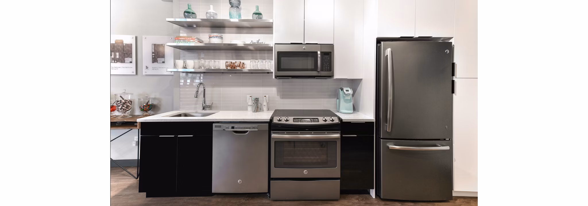 Modern kitchen with stainless steel appliances at Boston East Apartments