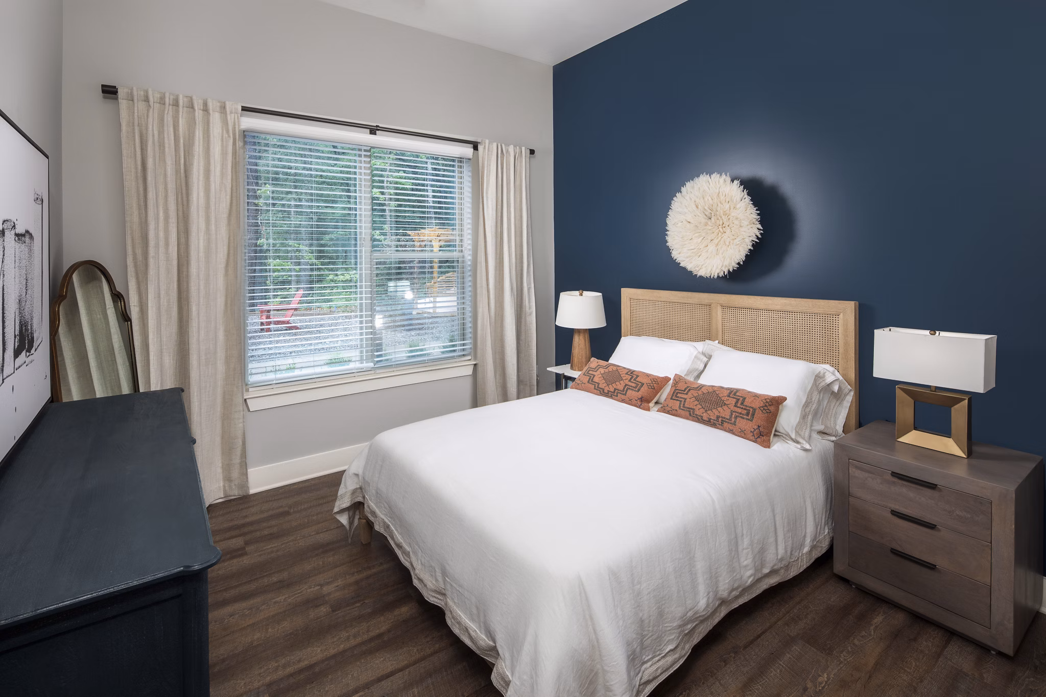 Cozy bedroom with modern furnishings at Broadstone Trailside Apartments, showcasing a serene retreat for residents