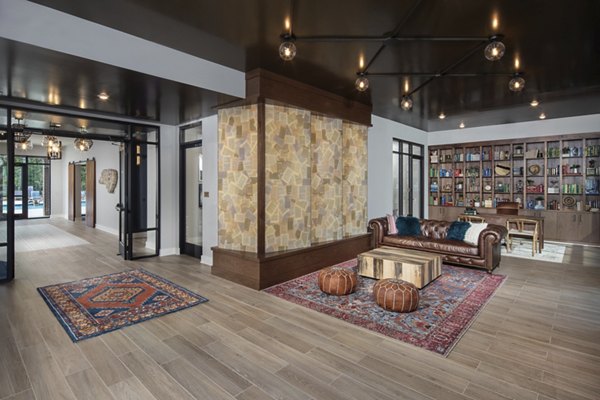 Clubhouse with modern design and cozy seating at Broadstone Trailside Apartments