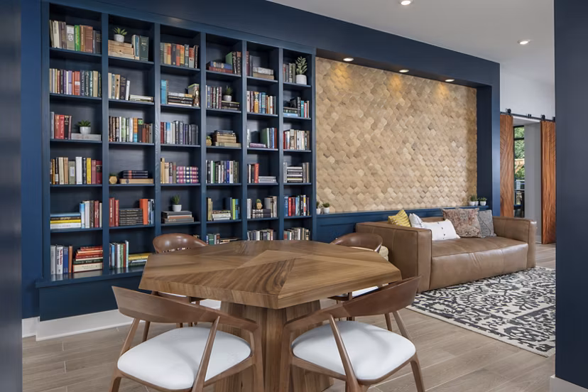 Clubhouse with modern interiors and plush seating at Broadstone Trailside Apartments, perfect for social gatherings and relaxing moments