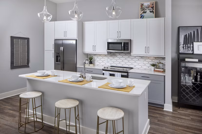 Modern kitchen with stainless steel appliances at Broadstone Trailside Apartments