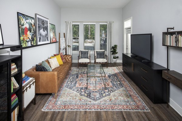Bright living room with modern decor at Broadstone Trailside Apartments, featuring excellent amenities for luxury living