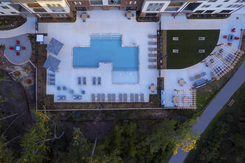 Resort-style outdoor pool at Broadstone Trailside Apartments offering luxurious relaxation and leisure