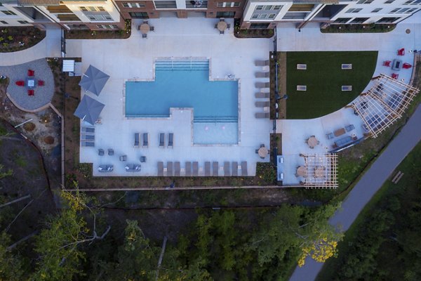 Resort-style outdoor pool at Broadstone Trailside Apartments offering luxurious relaxation and leisure