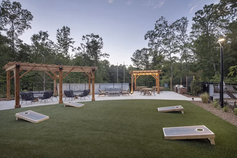 Spacious recreational area with modern seating at Broadstone Trailside Apartments
