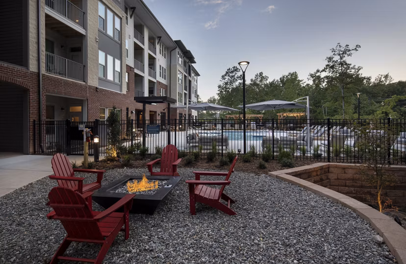 Fire pit and pool area at Broadstone Trailside Apartments offering luxury outdoor amenities