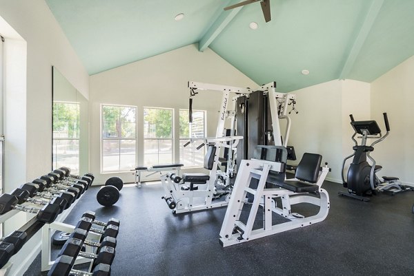 fitness center at The Arbors Apartments