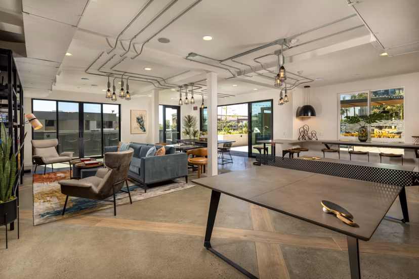 Clubhouse offering cozy seating and modern design at Garrison Apartments