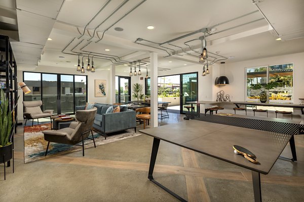 Clubhouse offering cozy seating and modern design at Garrison Apartments