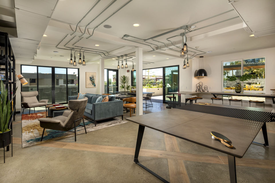 Clubhouse offering cozy seating and modern design at Garrison Apartments