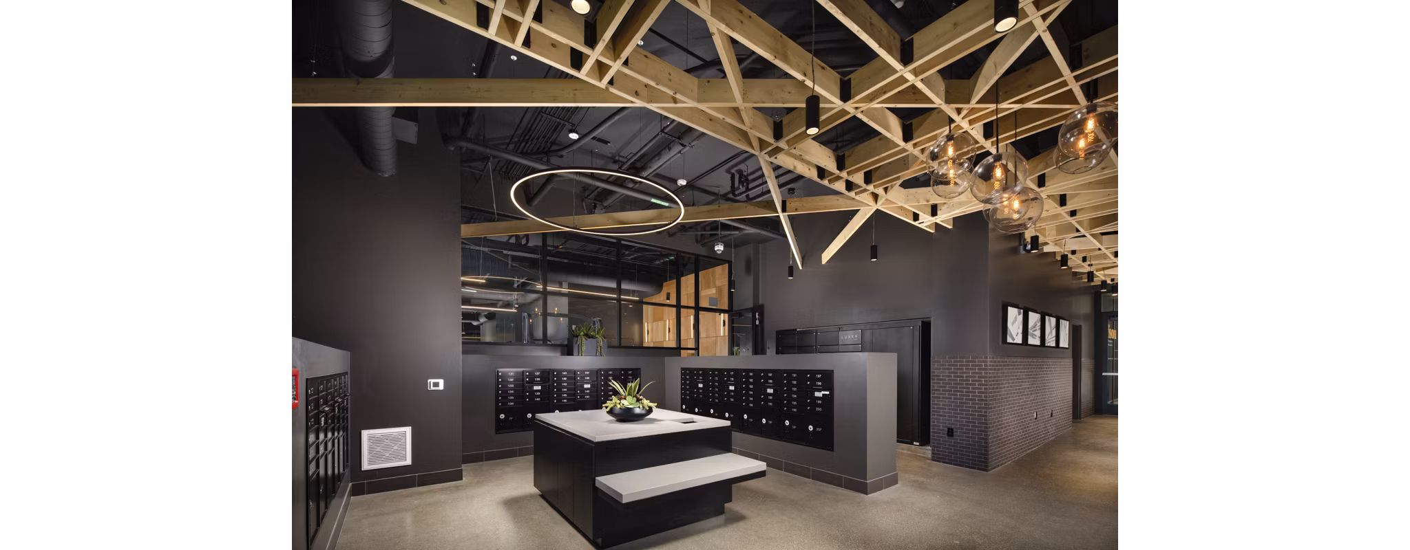 Mail room at Garrison Apartments with package lockers for secure deliveries