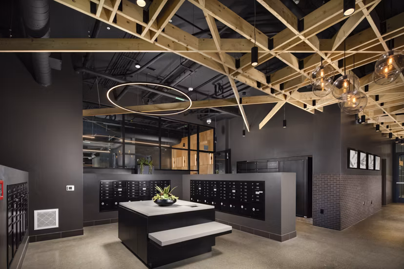 Mail room at Garrison Apartments with package lockers for secure deliveries