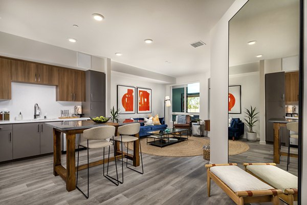 Elegant dining area with modern furnishings in Garrison Apartments