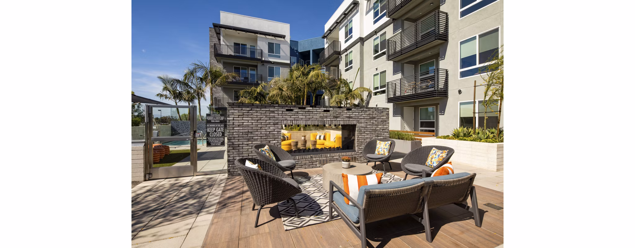 Cozy outdoor fire pit at Garrison Apartments, a key amenity for relaxation and socializing in this luxury community