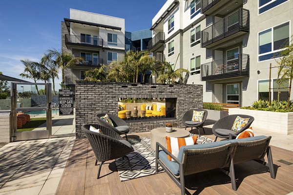 Cozy outdoor fire pit at Garrison Apartments, a key amenity for relaxation and socializing in this luxury community