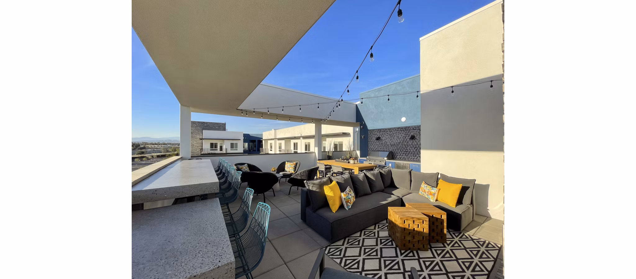 Rooftop deck offering city views at Garrison Apartments luxury homes