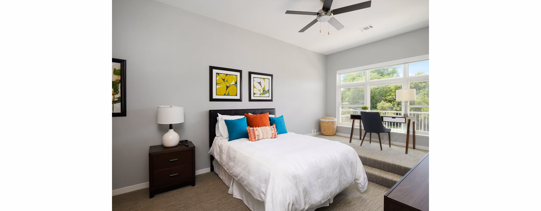 Cozy bedroom with plush bedding and modern decor at Brookside 51 Apartments