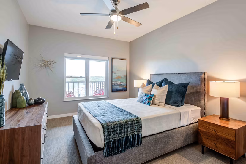 Cozy bedroom with modern decor in Brookside 51 Apartments