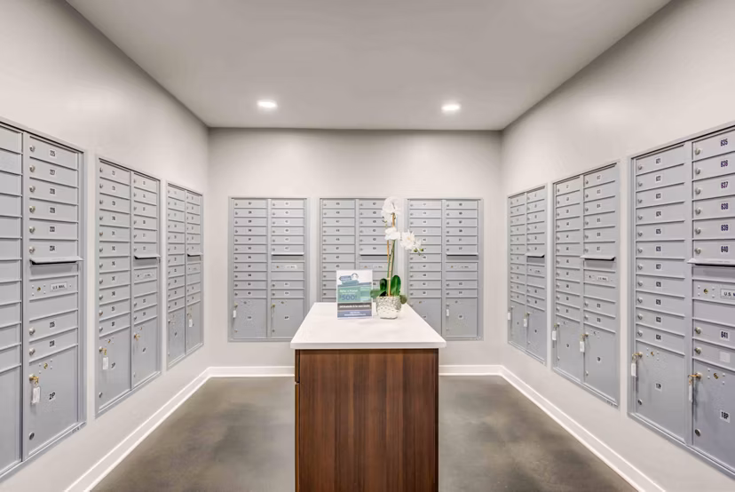 Mail room featuring secure package lockers at Brookside 51 Apartments