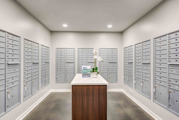 Mail room featuring secure package lockers at Brookside 51 Apartments