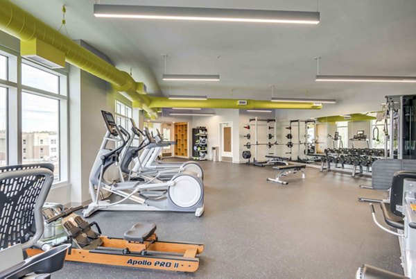 Modern fitness center with state-of-the-art equipment at Brookside 51 Apartments, offering a premium workout experience for residents