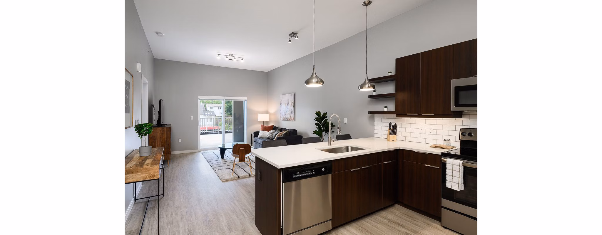 Modern kitchen with stainless steel appliances at Brookside 51 Apartments