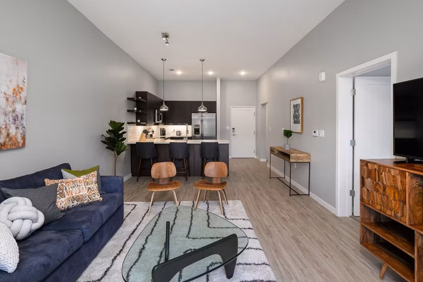 Spacious living room with modern furnishings at Brookside 51 Apartments