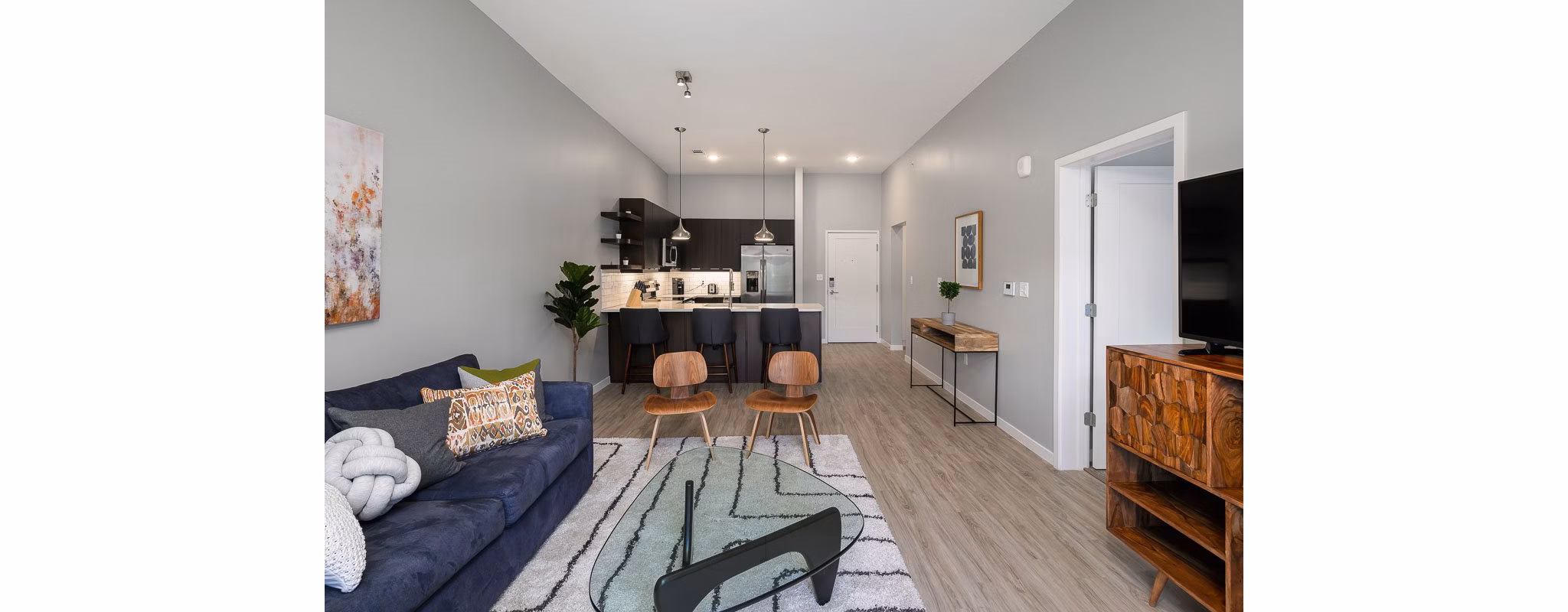 Spacious living room with modern furnishings at Brookside 51 Apartments