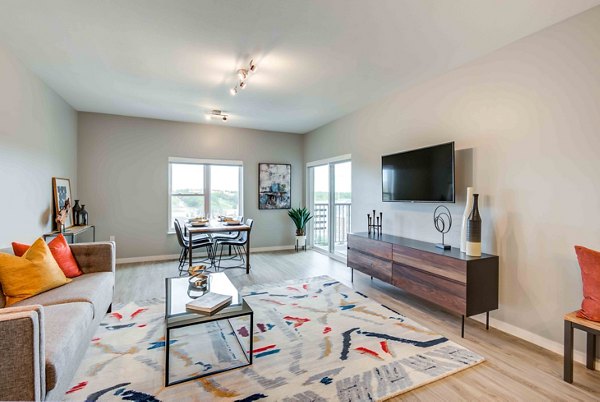 Spacious living room with modern decor at Brookside 51 Apartments