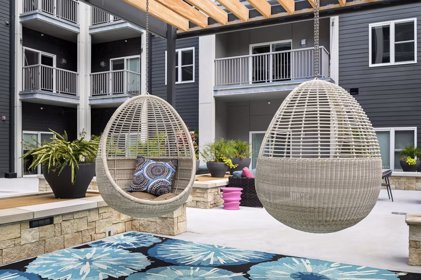 Courtyard with manicured gardens at Brookside 51 Apartments offering luxury living