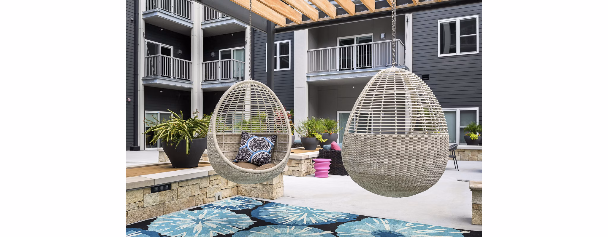 Courtyard with manicured gardens at Brookside 51 Apartments offering luxury living