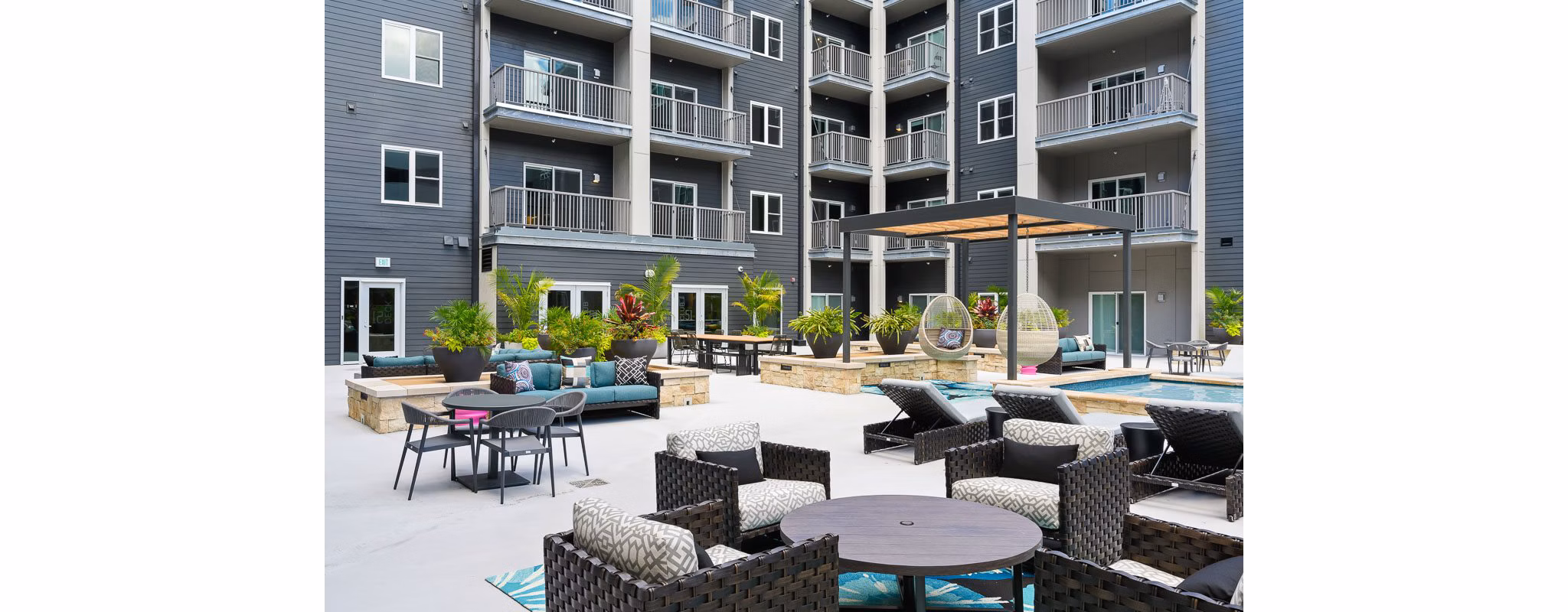 Tranquil courtyard with lush greenery at Brookside 51 Apartments